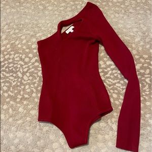 Red bodysuit from these three boutique